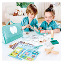 Children explore dental care with the Hape Super Smile Dental Clinic Set, featuring toy teeth, tools, and educational cards.
