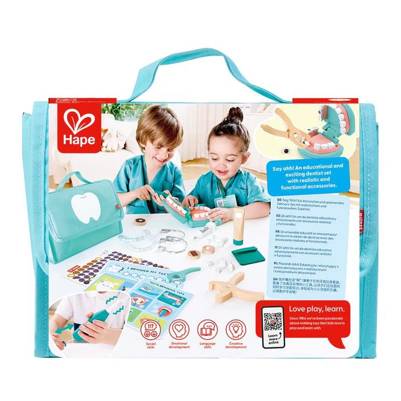 Hape Super Smile Dental Clinic Set featuring two children in dental coats, examining dental tools and accessories.