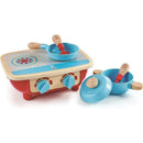 Wooden toddler kitchen set featuring a red stove with blue cooking pots and utensils. Ideal for imaginative play.