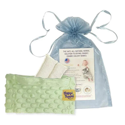 Green Happi Tummi aromatherapy wrap for babies, accompanied by herbal inserts and a informational pouch.