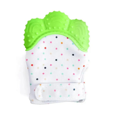 Green silicone teether mitten designed for babies, featuring a soft dotted white fabric and textured grip for teething relief.