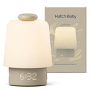 Hatch Baby Sleep Support in greige, a sound machine and night light with a digital clock displaying 6:32.