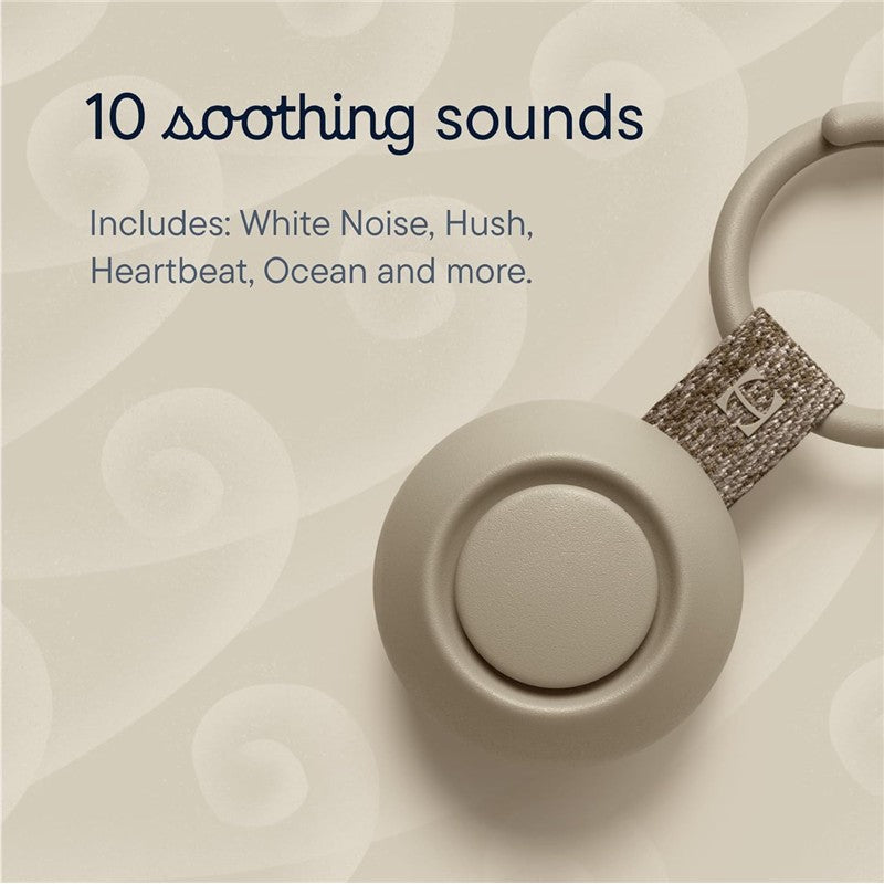 Hatch Go Portable Sound Machine in greige color, featuring a round button and textured strap, offers 10 soothing sounds.