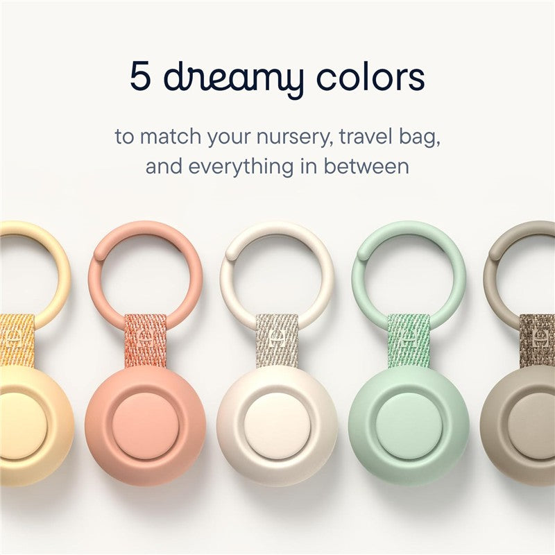 Five portable sound machines in pastel colors, each with a loop for attachment, showcasing their versatility for travel and nurseries.