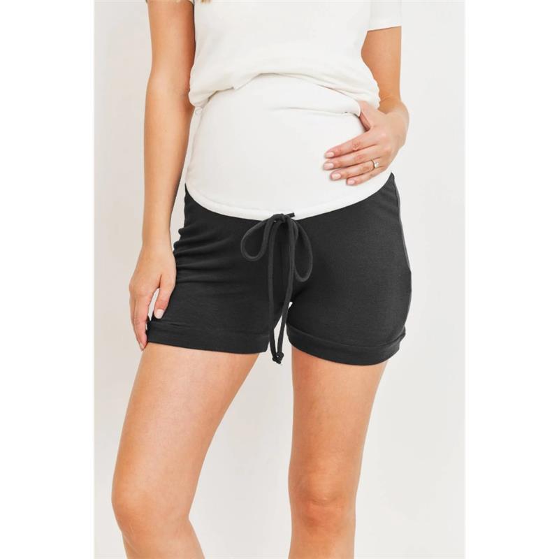 Solid black maternity shorts with an over-the-belly design, worn by a model holding her belly.