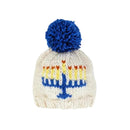 Menorah beanie hat for babies and kids, cream color with blue pom-pom and colorful menorah design.
