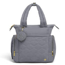 Cozy HUGGIES Hugpack Tote Diaper Bag in Quiet Smoke Quilted design, featuring gold accents and multiple zippered compartments.
