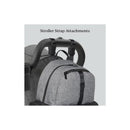 HUGGIES Day Pack Diaper Backpack in Bridal Rose/Two Tone with stroller strap attachments, displayed on a stroller.