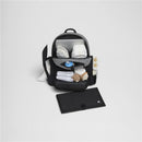 HUGGIES Day Pack Diaper Backpack in Bridal Rose/Two Tone, open with diapers, bottles, and a changing mat visible inside.