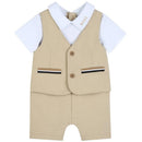 Hugo Boss 3-in-1 jumpsuit set with beige vest, white polo shirt, and shorts, featuring pockets and button details.