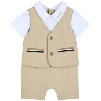 Hugo Boss 3-in-1 jumpsuit set with beige vest, white polo shirt, and shorts, featuring pockets and button details.