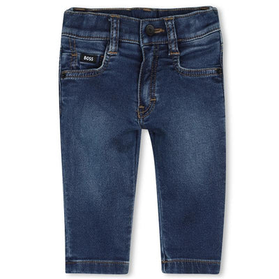 Denim pants for boys by Hugo Boss, featuring a dark wash, classic five-pocket design, and logo label.
