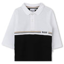 Long sleeve black and white polo for boys by Hugo Boss, featuring a buttoned collar and logo detail.