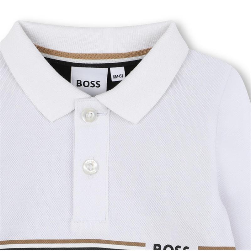 Long sleeve black and white polo shirt by Hugo Boss for boys, featuring a classic collar and button closure.