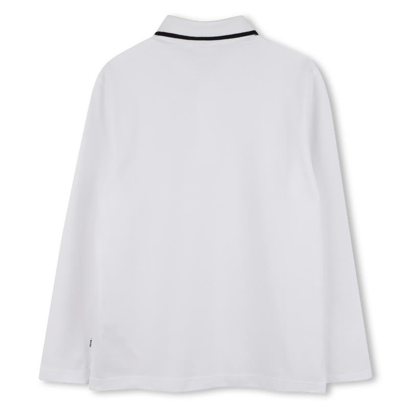 Long sleeve white polo shirt for boys by Hugo Boss, featuring a black collar trim and a simple solid color design.