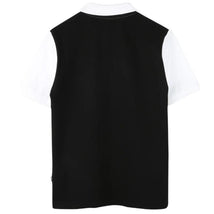 Black and white short sleeve polo shirt for boys, featuring a solid black back and white sleeves.