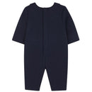 Navy blue romper for boys, featuring short sleeves and a back closure, designed in a suit style.