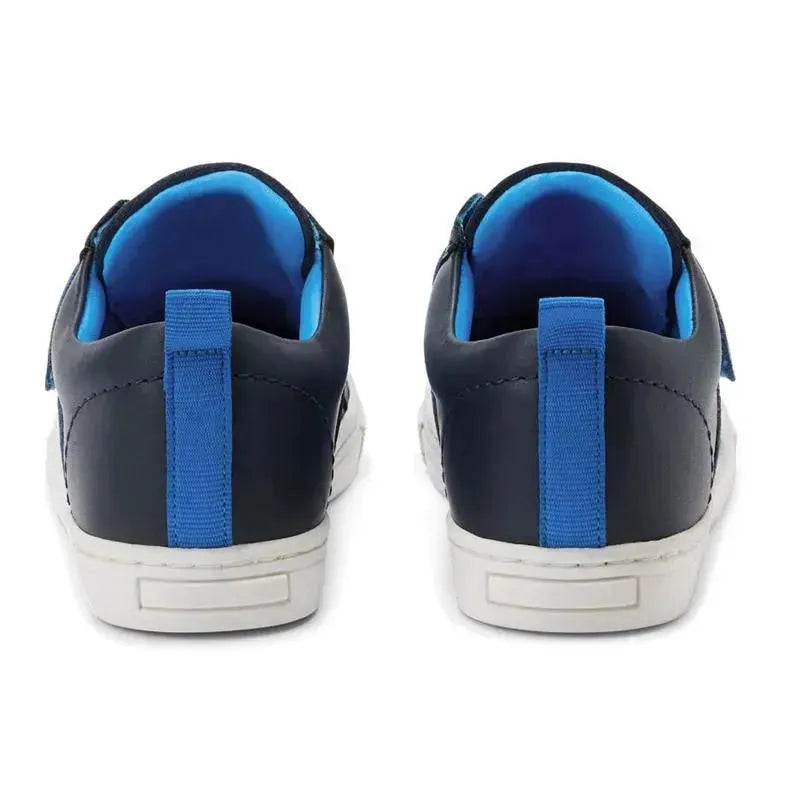 Boys navy Velcro trainers by Hugo Boss featuring a blue interior and contrasting white soles.