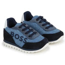 Navy denim sneakers for boys by Hugo Boss, featuring a logo on the side and a sturdy white rubber sole.