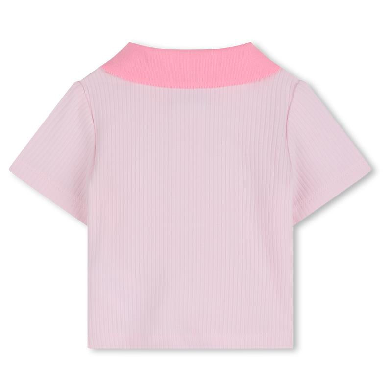 Light pink Hugo Boss baby girl polo showing ribbed texture with a contrast pink collar.