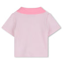 Light pink Hugo Boss baby girl polo showing ribbed texture with a contrast pink collar.