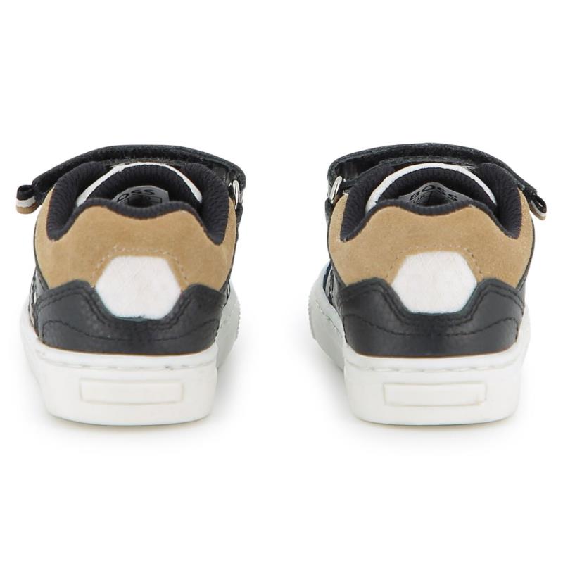 Black Hugo Boss baby sneakers made of cow leather and canvas, featuring a stylish design with contrasting tan accents.