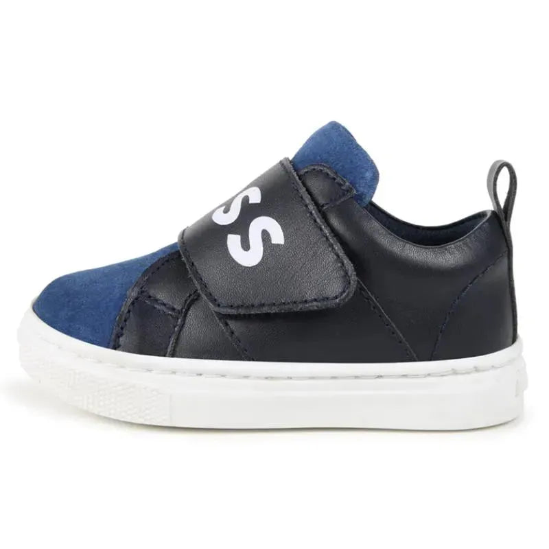 Navy Hugo Boss Baby sneakers featuring an elastic logo strap and a white sole, designed for comfort and style.