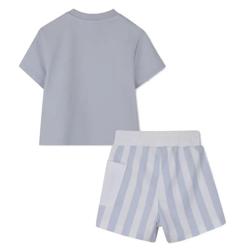 Stone-colored Hugo Boss baby t-shirt in a solid shade paired with striped light blue shorts featuring a white waistband.