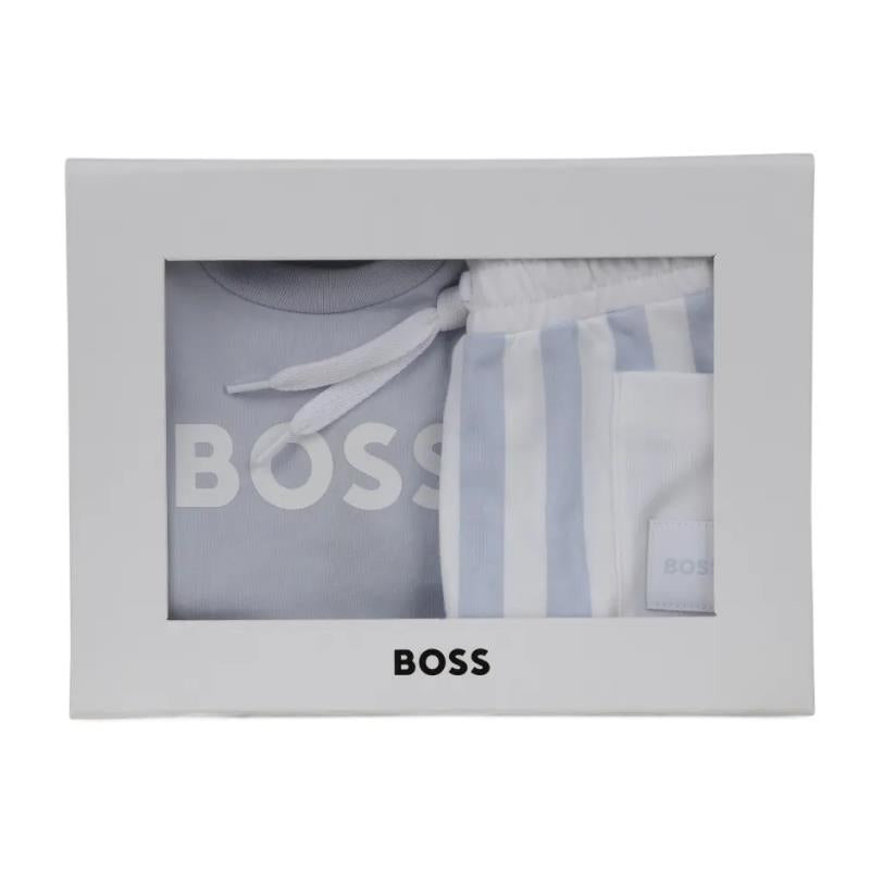 Hugo Boss baby t-shirt in stone color and striped shorts, displayed in a white box with the brand logo.