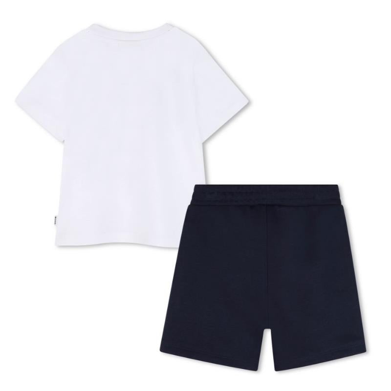 White cotton jersey baby tee shirt paired with navy Bermuda shorts. Suitable for casual wear.