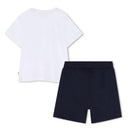 White cotton jersey baby tee shirt paired with navy Bermuda shorts. Suitable for casual wear.