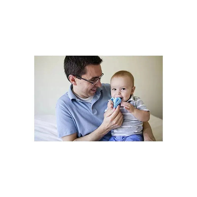 Father and baby smiling while the baby holds a blue Baby Banana infant toothbrush.