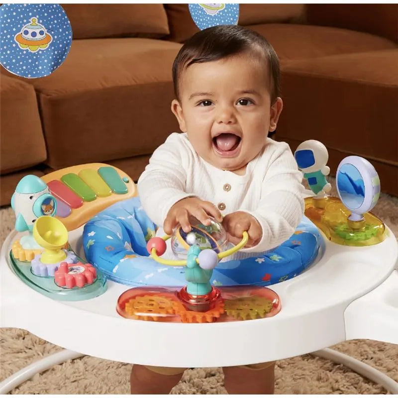 Infantino 360 Magic Motion Activity Center featuring a joyful baby playing with colorful toys and interactive elements.