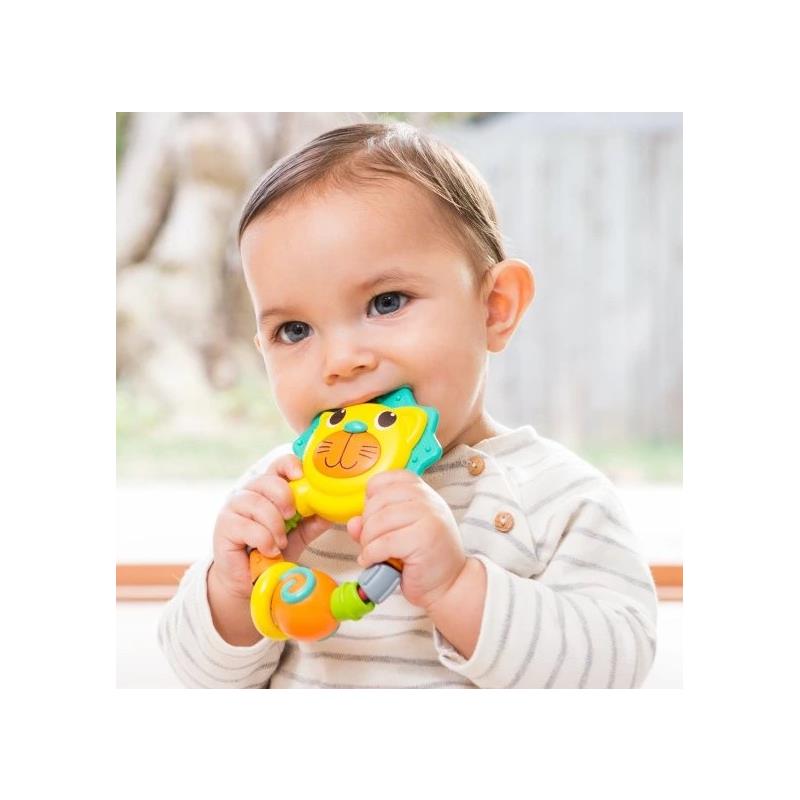 Baby happily chewing on an Infantino Bendy Teether shaped like a lion, featuring bright colors and a flexible design.