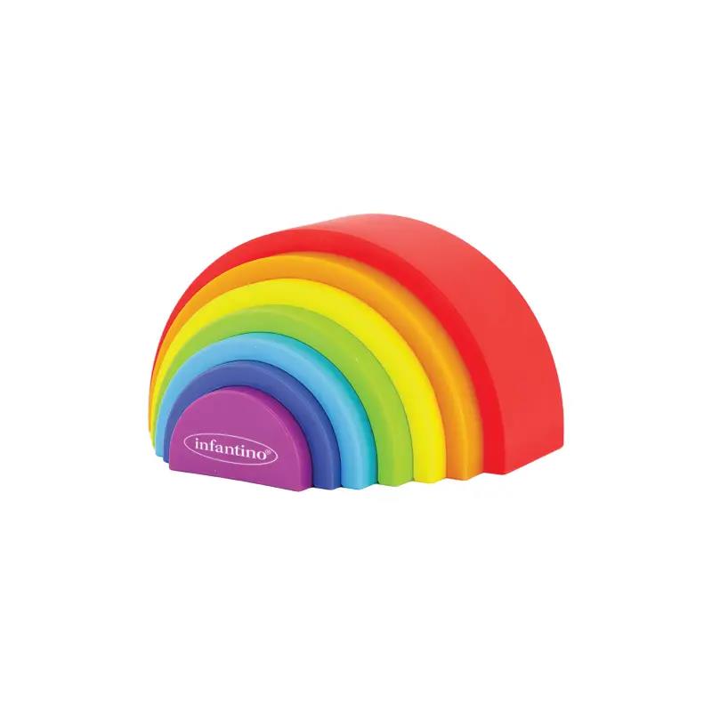 Colorful plastic stacking toy featuring rainbow arcs in red, orange, yellow, green, blue, and purple, branded by Infantino.