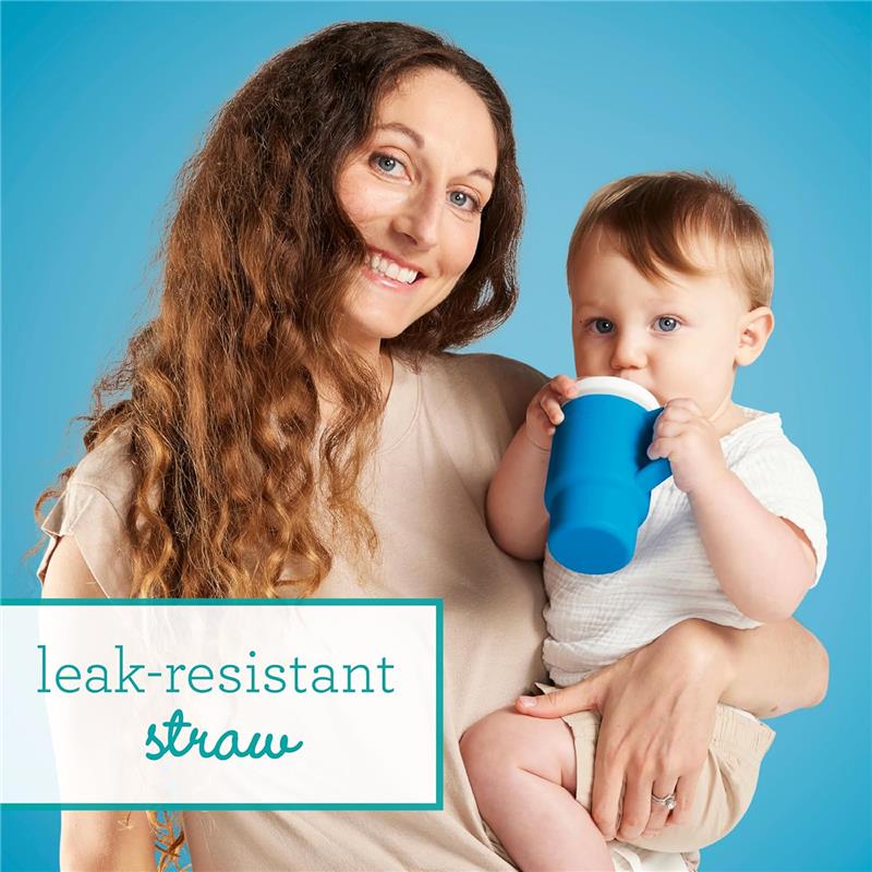 Mother holding a toddler with a blue silicone tumbler featuring a leak-resistant straw against a blue background.