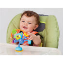 Infantino Stick & Spin High Chair Pal toy with a smiling baby, sitting in a high chair, engaging with the colorful spinning toy.