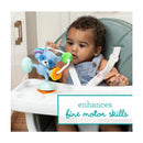 Infantino Stick & Spin Pal, Raccoon toy on a high chair; enhances fine motor skills for a toddler engaged in play.