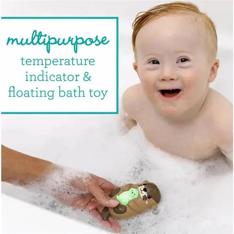 Multipurpose Infantino otter bath toy floats in bubble bath, serving as a temperature indicator for kids.