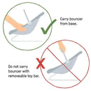 Instructions for carrying the Ingenuity baby bouncer: carry from base, avoid carrying with removable toy bar.