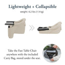 Lightweight, collapsible Inglesina Fast Table Chair in Slate Blue Melange, with carry bag stored underneath.