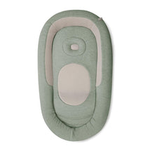 Inglesina Welcome Pod Lounger in Balance Green with a soft, rounded design and breathable fabric for infant comfort.