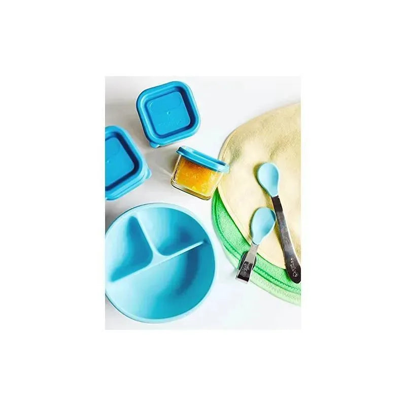 IPlay Learning Spoon Set in aqua color, including a divided bowl, storage containers, baby spoons, and a soft cloth.