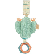 Green cactus-shaped attachable travel toy with textured arms and a hexagonal teething ring at the bottom.