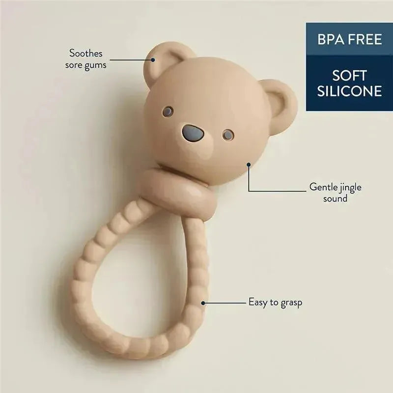 Bear-shaped silicone rattle for infants, features BPA-free material, soothing design, gentle jingle sound, and easy-to-grasp handle.