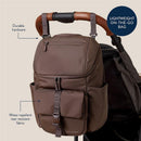 Modern unisex Itzy Ritzy Belong Bucket Backpack in mocha, featuring durable hardware and water-repellent fabric.