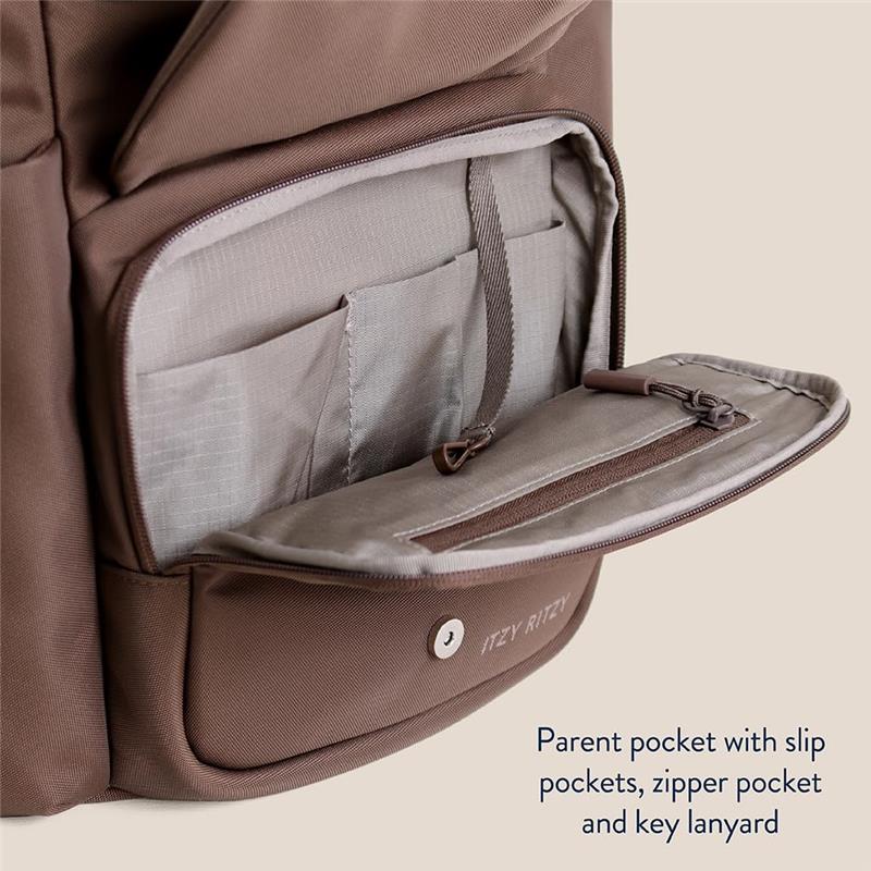 Mocha Itzy Ritzy Belong Bucket Backpack™ featuring a parent pocket with slip pockets, a zipper pocket, and a key lanyard.