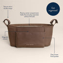 Brown Itzy Ritzy Belong Carry-All Caddy featuring secure velcro stroller straps, magnetic closure, and front pocket for organization.