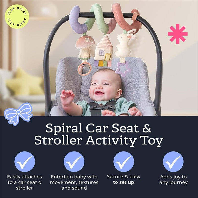 Pastel spiral activity toy featuring a mushroom, house, and bunny, attached to a car seat. Smiling baby interacts with it.