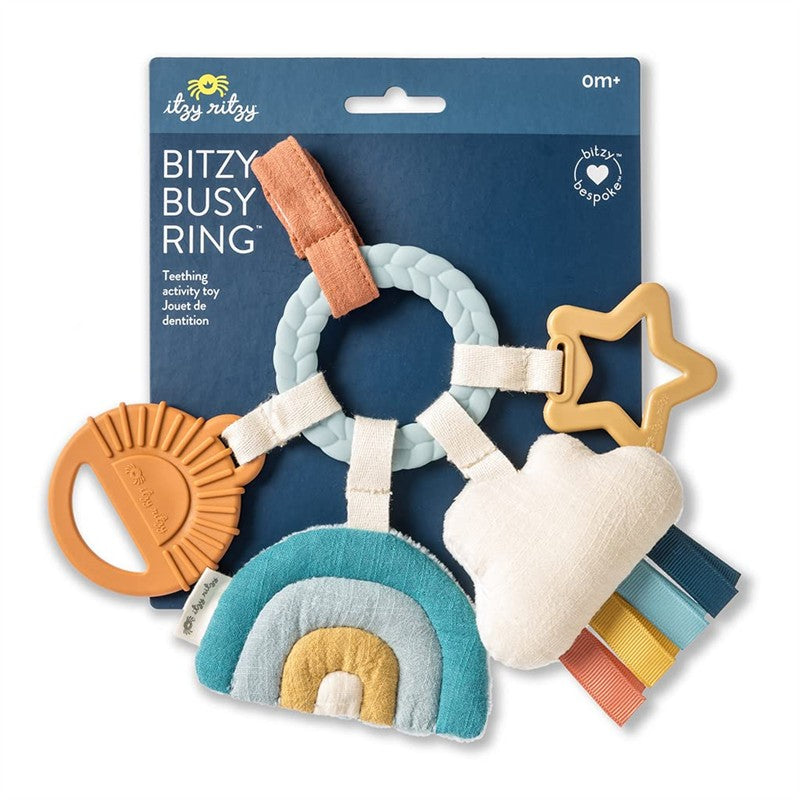 Teething activity toy featuring a cloud, star, rainbow, and textured rings, designed for infants aged 0 months and up.